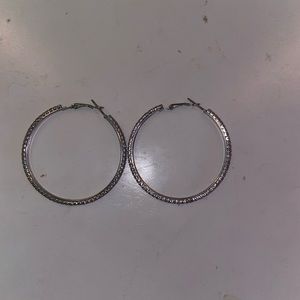 Super cute silver hoop earrings.